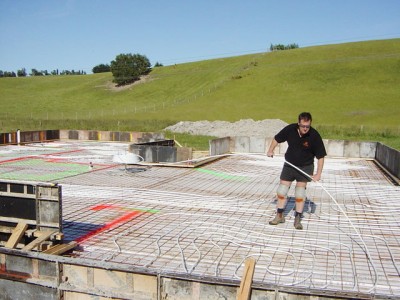 Underfloor pipe being laid