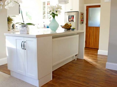 Radiator hidden under the kitchen bench