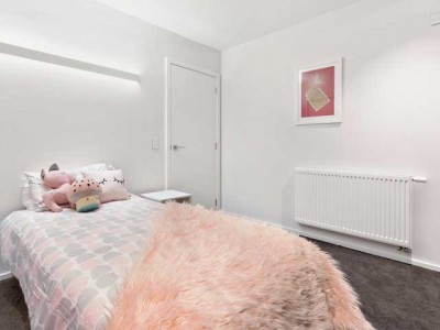Kids bedroom with a radiator