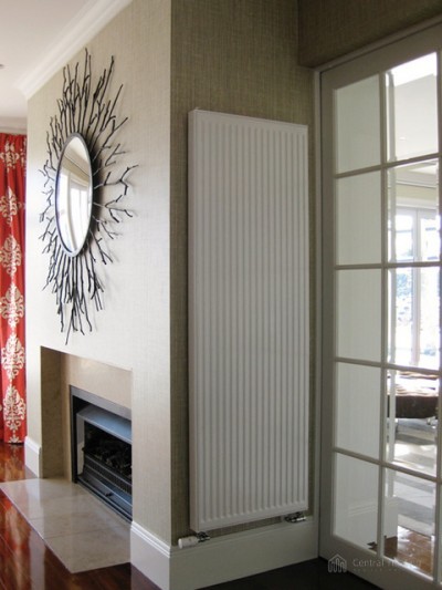 Vertical radiator in living room